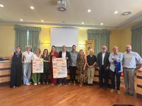 conferenza stampa cartellone liberazione 